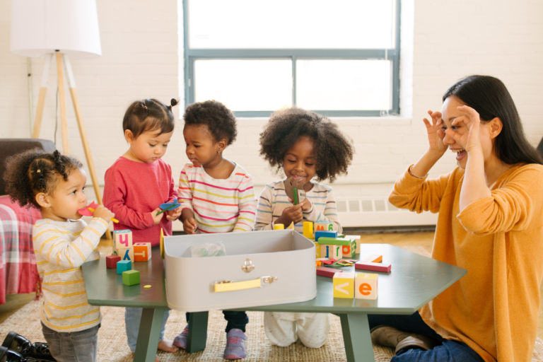 Children playing in a childcare classroom at The Learning Academy